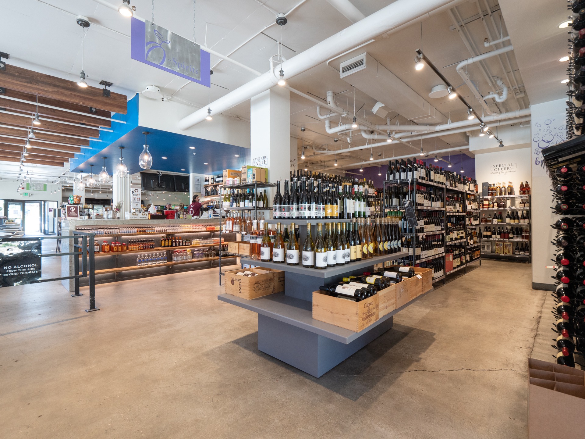 Wine and spirits shelves inside Wild Plum Spirits